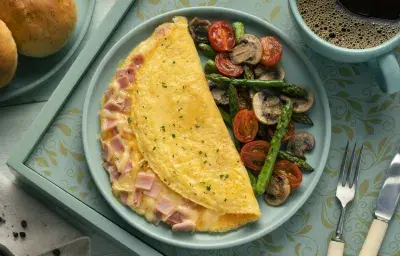 Omelette de jamón y queso La Lechera