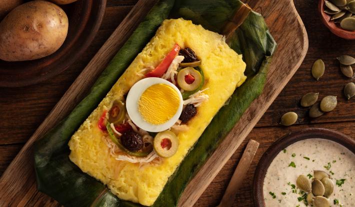 Tamal de papa con ají de pepa de sambo